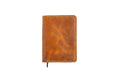 Brown full grain leather journal cover with pen holder and card slots hand stitched for men and women.